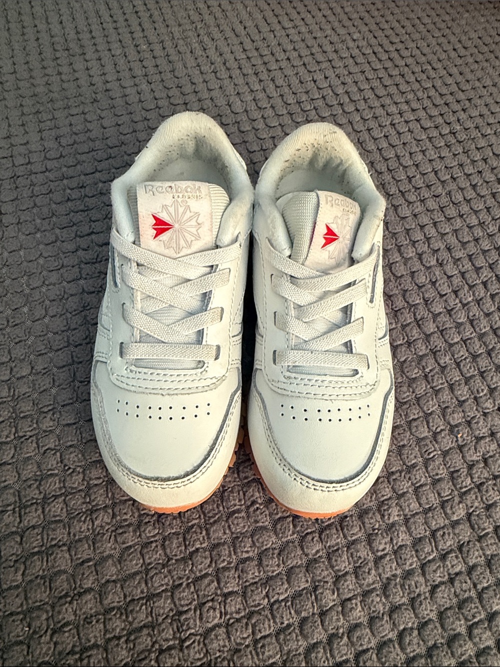 Reebok Kids White Leather Sneakers with Red Logo Accent